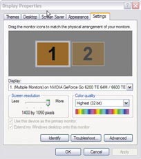 Display Properties dialog on the Settings tab, showing two monitors and an Advanced button.
